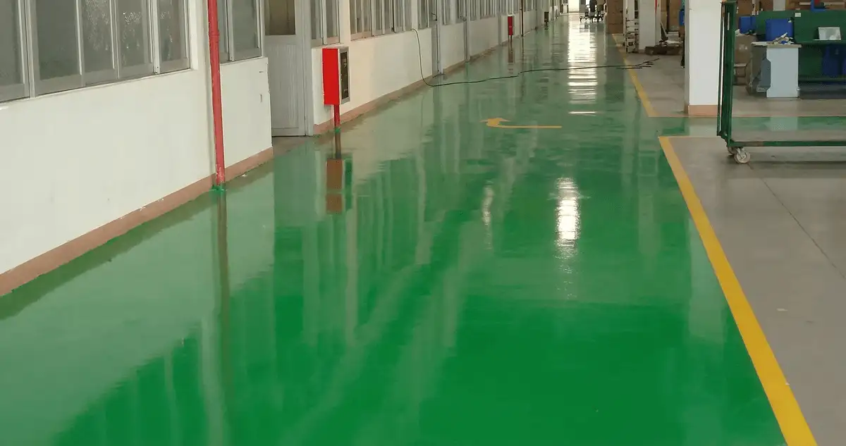 A factory floor professionally covered and marked with epoxy flooring in Nashua, NH