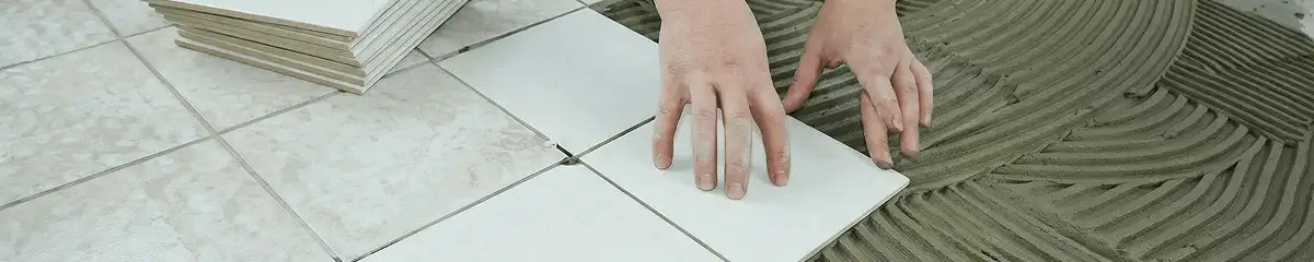 Professional installing white tile floors in Nashua, NH
