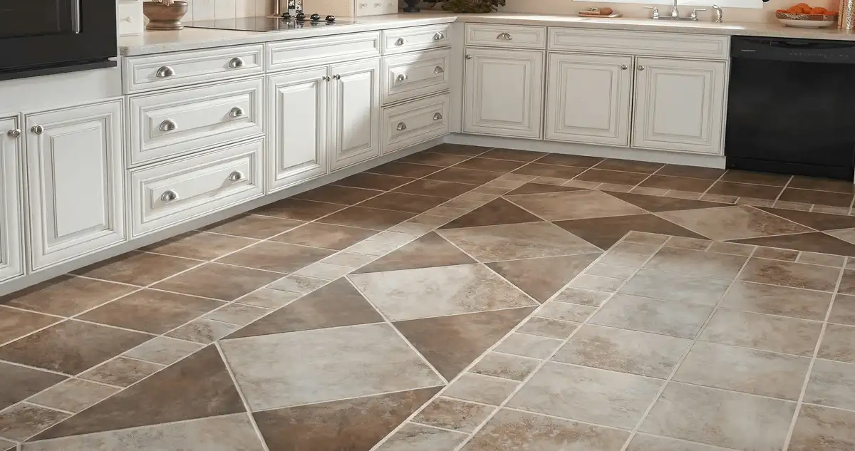 Kitchen with white cabinets and a professionally installed tile floor in Nashua, NH