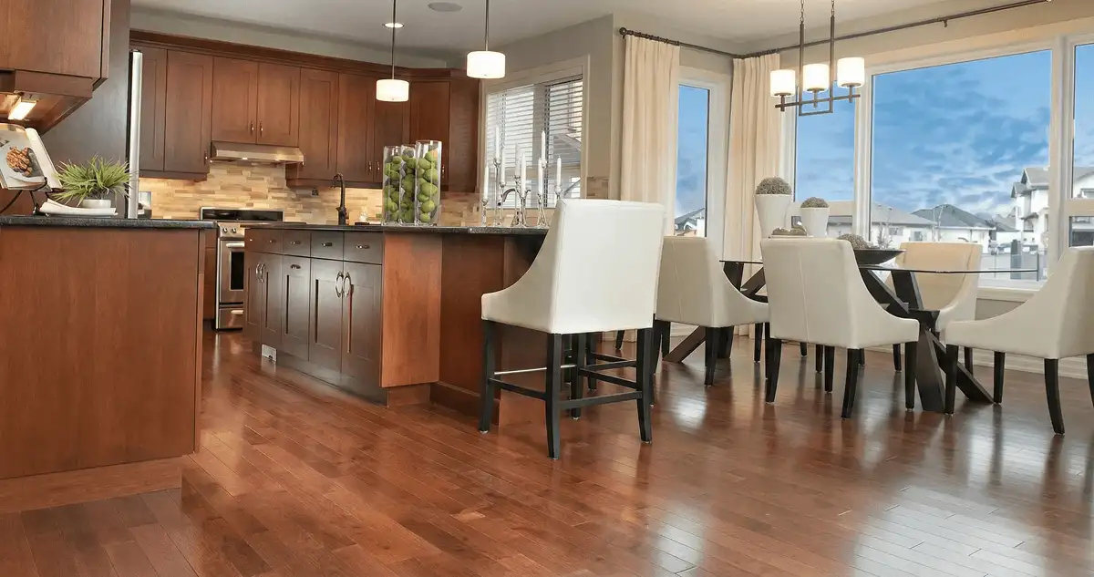 A modern kitchen with professionally installed wood flooring in Nashua, NH